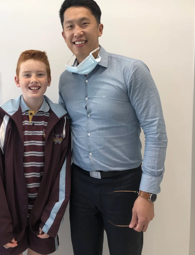 Dr Shaun Goh with a young Go Orthodontics patient