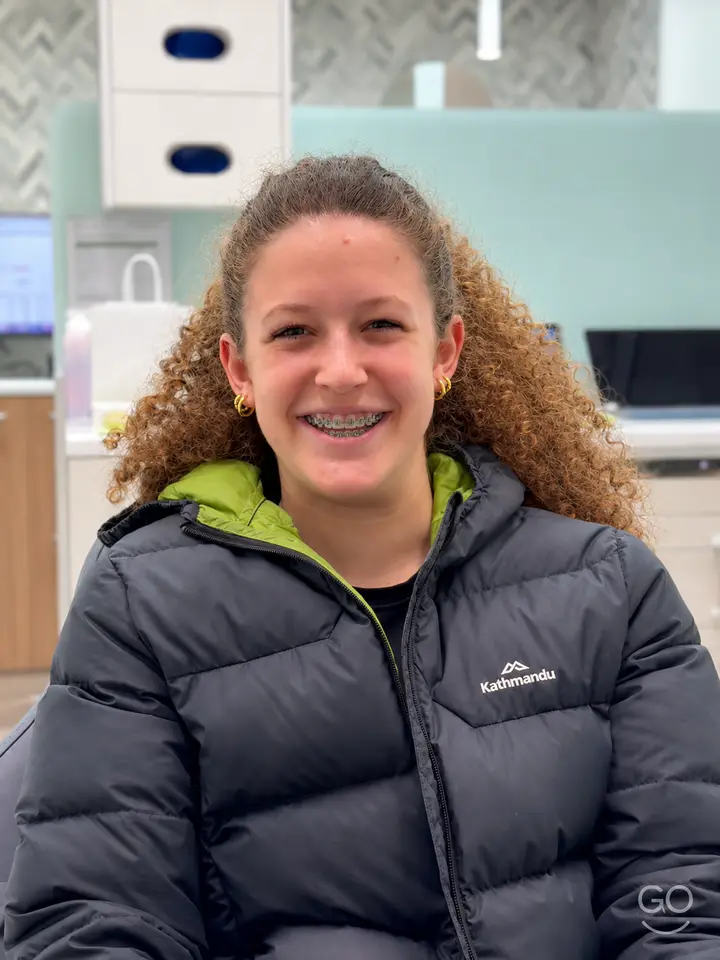 Go Orthodontics teenage patient wearing braces
